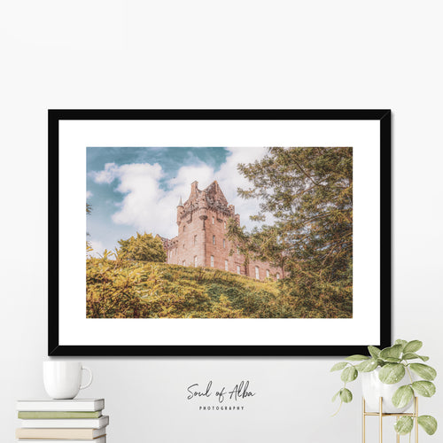 Brodick Castle fine art print displayed as Scottish wall art in a contemporary interior, featuring the historic Isle of Arran landmark.