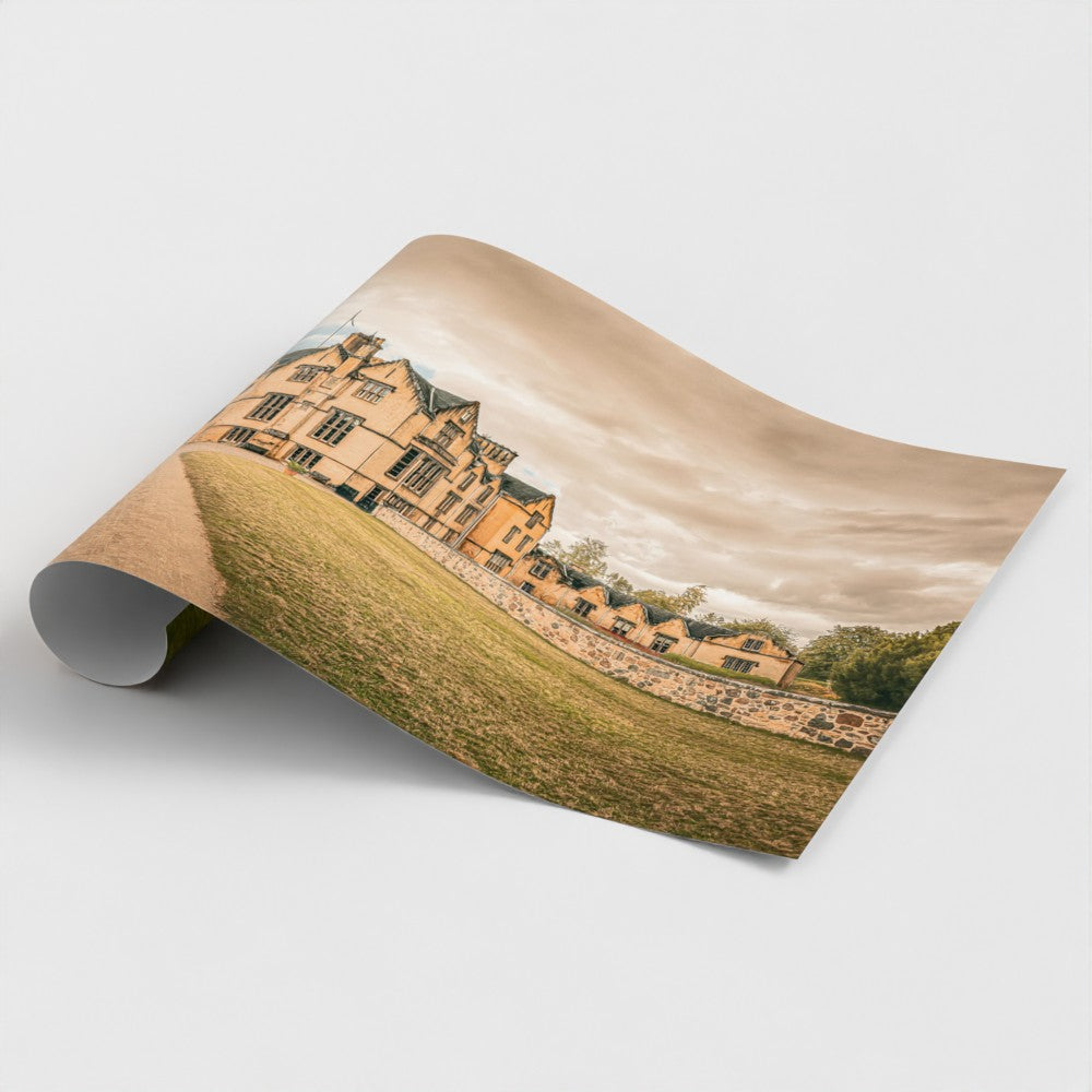 Rolled fine art print of Brodie Castle in Moray, Scotland, showcasing the historic castle, surrounding grounds, and expansive Scottish sky.