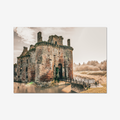 Ruins of an old castle with a moat and wooden bridge on a cloudy day.