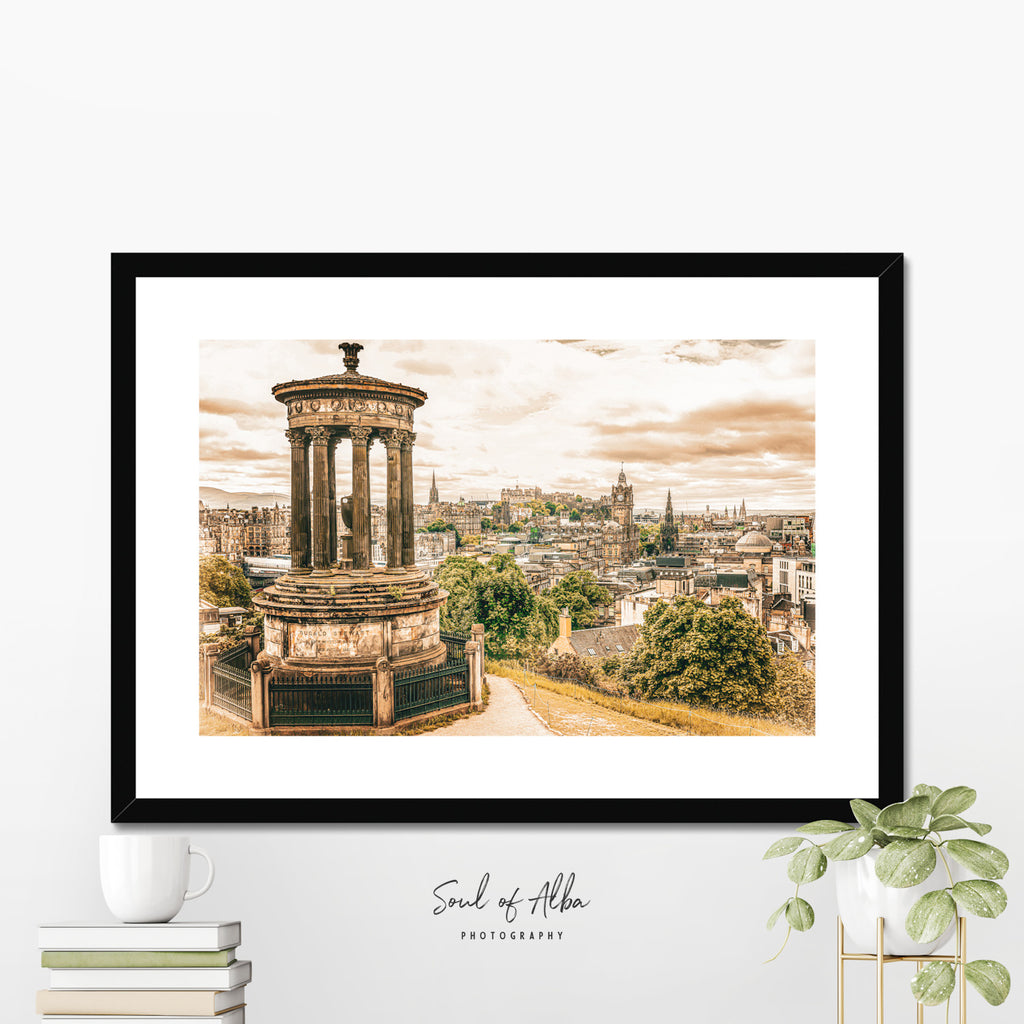 Warm-toned fine art print of Edinburgh cityscape from Calton Hill, showing New Town rooftops and Edinburgh Castle silhouette, Scotland