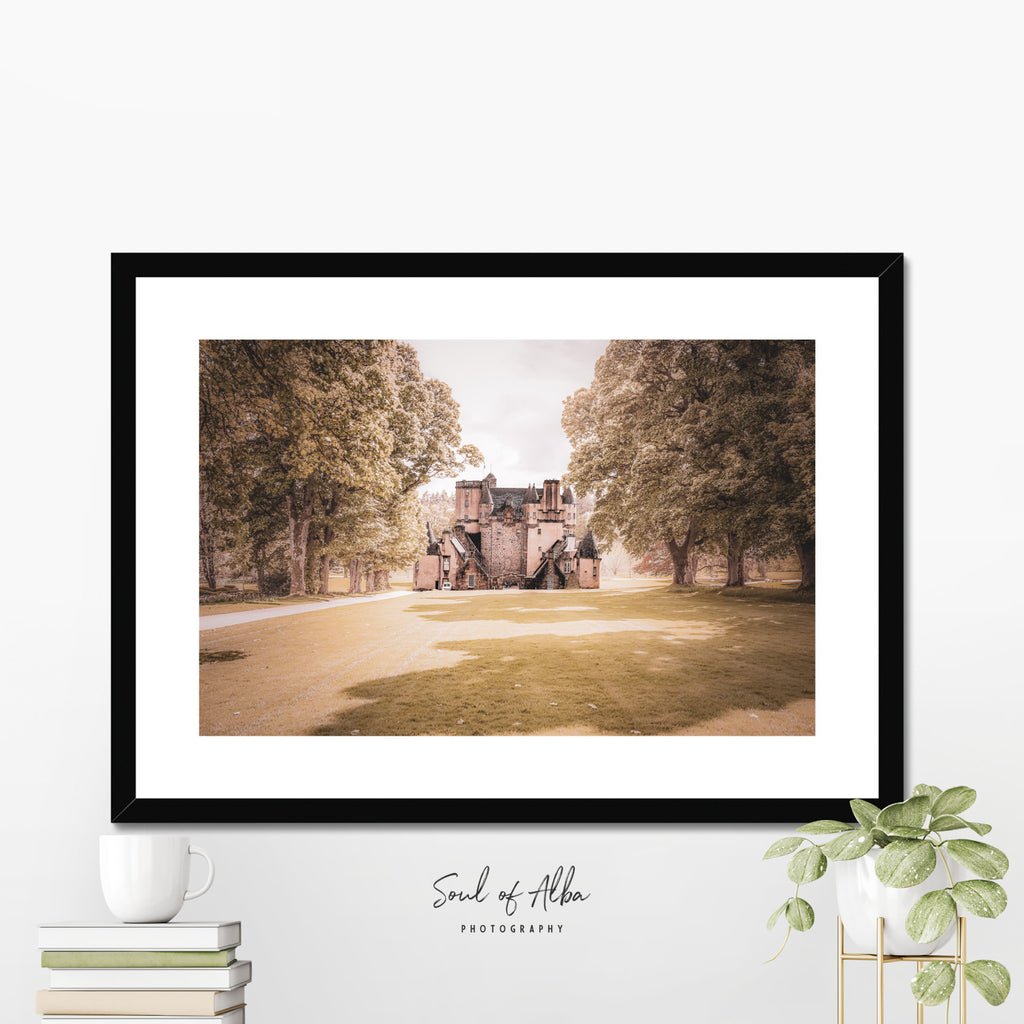 Framed wall art mock-up featuring a fine art photograph of Castle Fraser, Aberdeenshire, displayed in a modern interior.