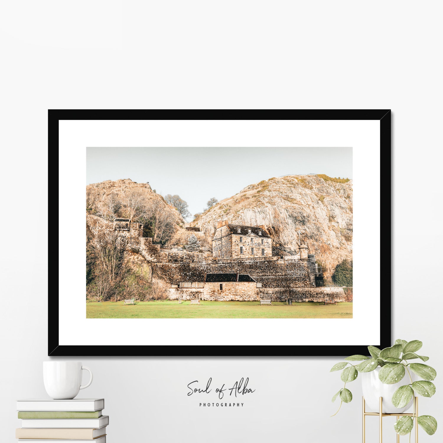 Framed print of Dumbarton Castle built against the dramatic volcanic rock of Dumbarton Rock in West Dunbartonshire, Scotland.