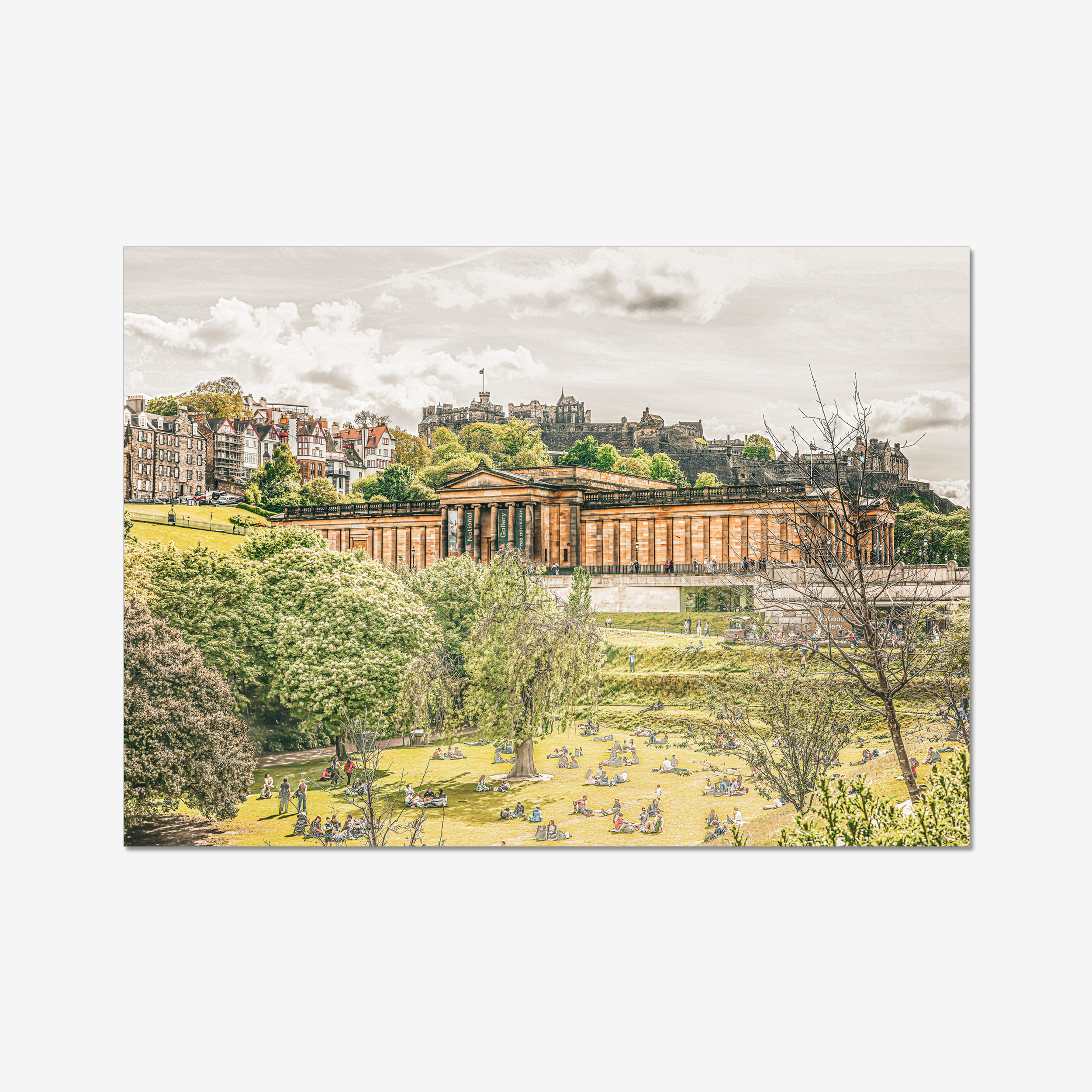 Fine art print of Princes Street Gardens with Edinburgh Castle in the background, showcasing lush greenery and historic architecture