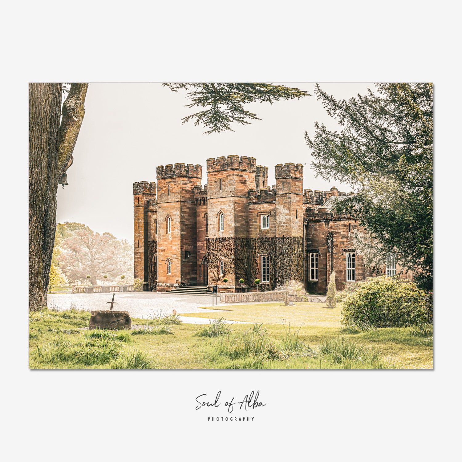 Fine art print of Scone Palace in Perthshire, Scotland, featuring the historic palace framed by mature trees and landscaped gardens.